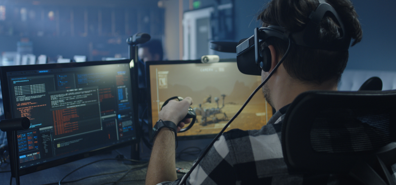 Developer playing a VR game or simulator